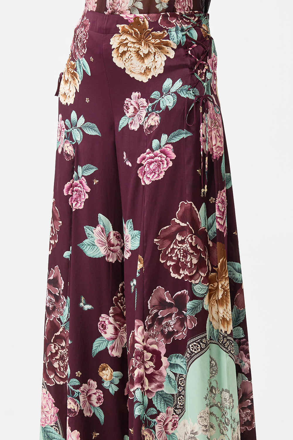 The CAMILLA LONG TIERED DRESS WITH BOW TIES PAPERS AND CURIOUS CAPERS in our  print.
