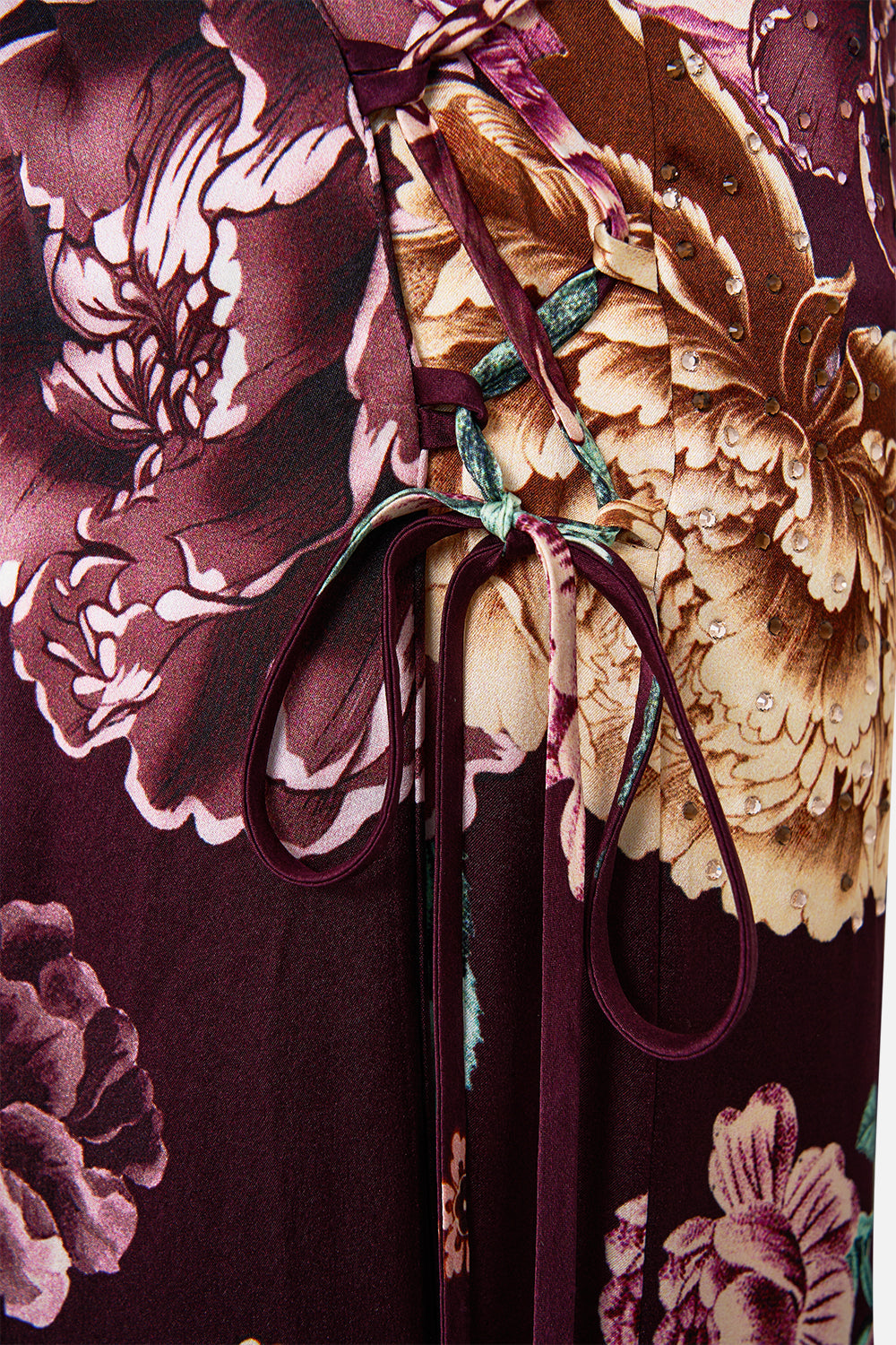 The CAMILLA LONG TIERED DRESS WITH BOW TIES PAPERS AND CURIOUS CAPERS in our  print.