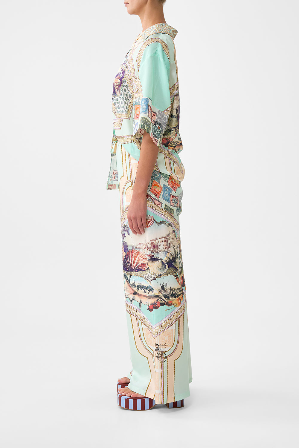 The CAMILLA DEEP V NECK HARDWARE KAFTAN FOOTSTEPS IN FOLKLORE in our  print.