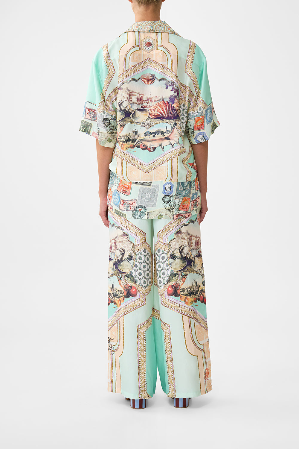 The CAMILLA DEEP V NECK HARDWARE KAFTAN FOOTSTEPS IN FOLKLORE in our  print.