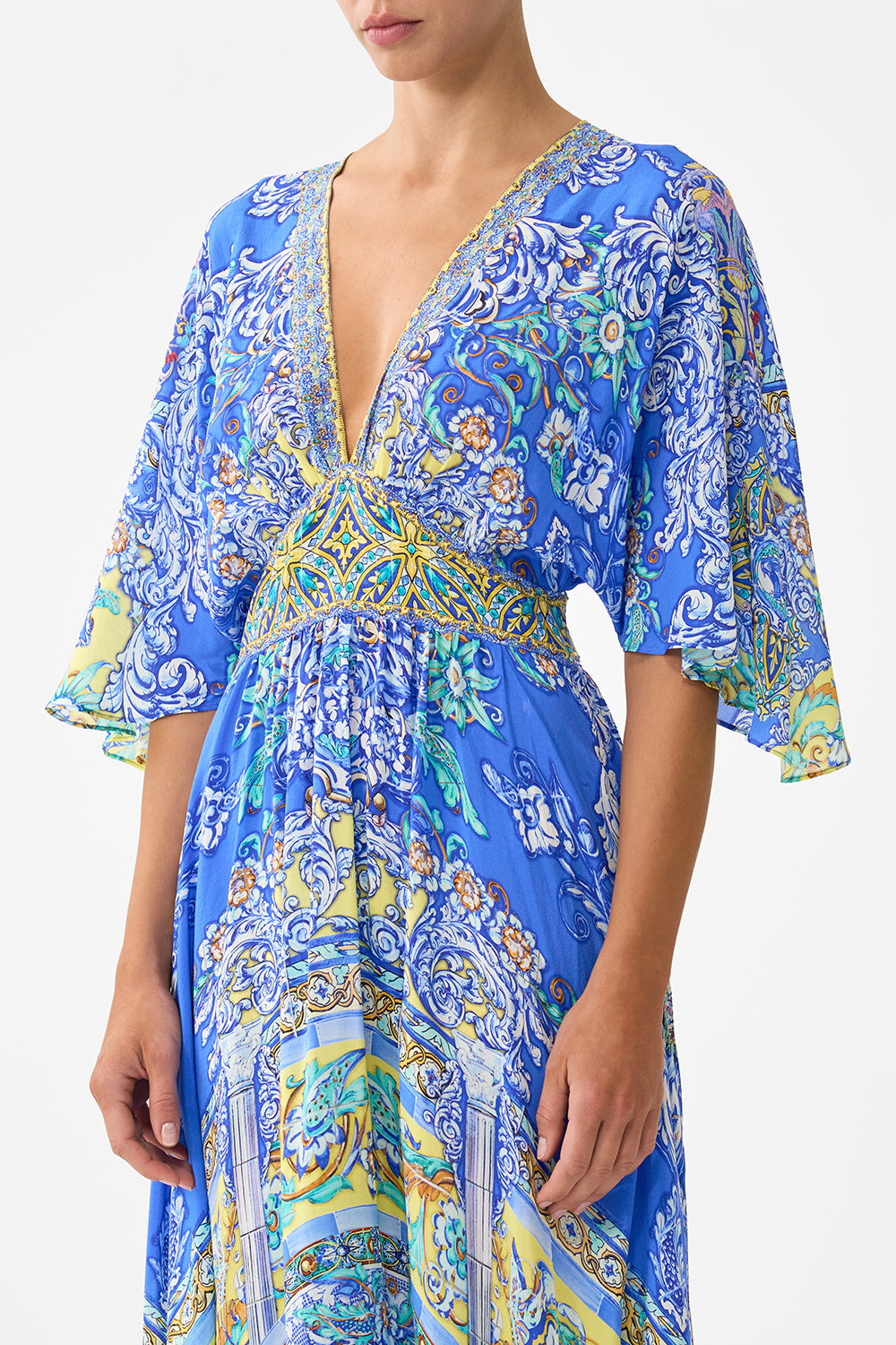 WAISTED DRESS WITH HEM RUFFLE BENEATH THE ANDALUSIAN SUN