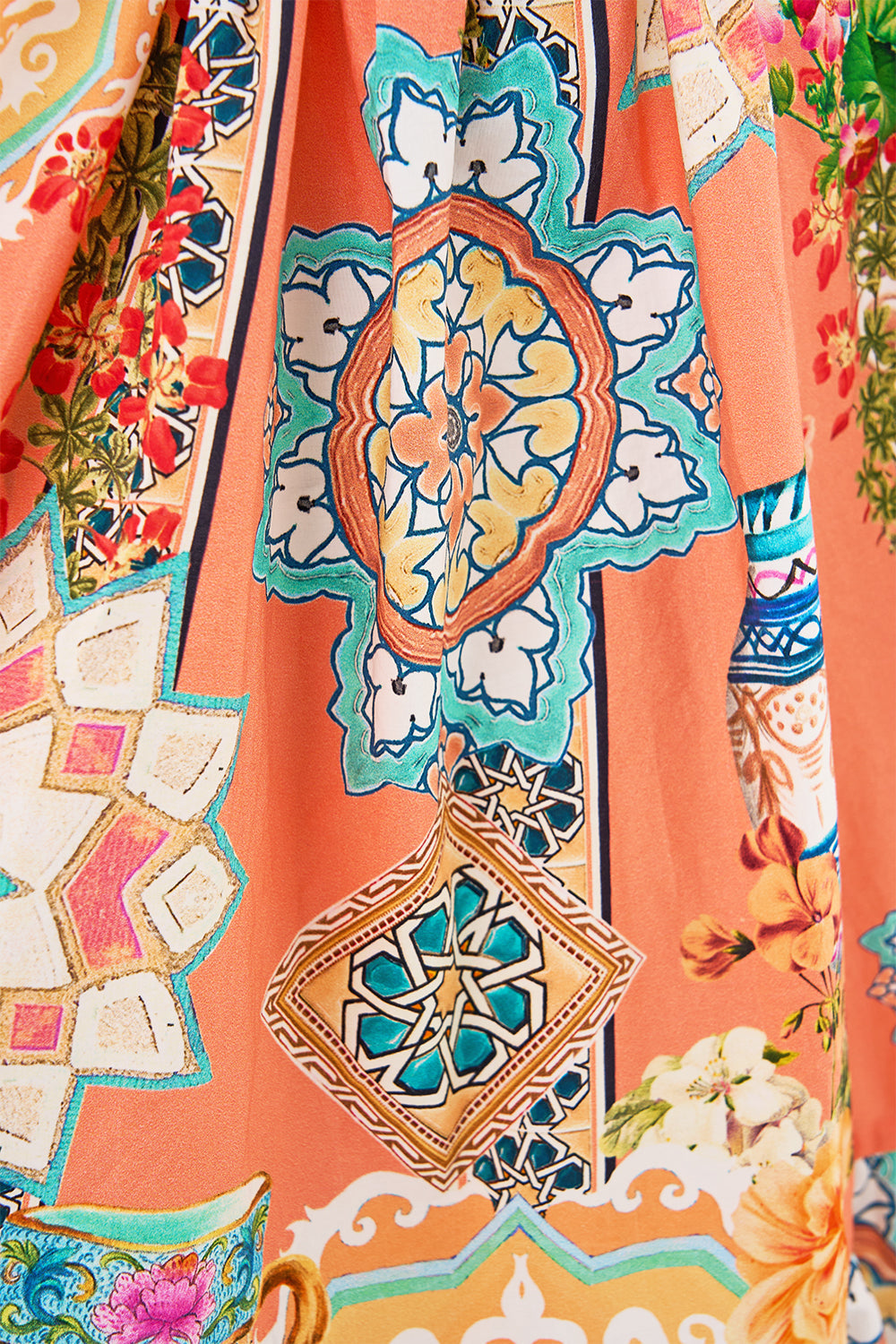 The CAMILLA DRAPE FRONT V NECK KAFTAN DAUGHTERS OF DUENDE in our  print.