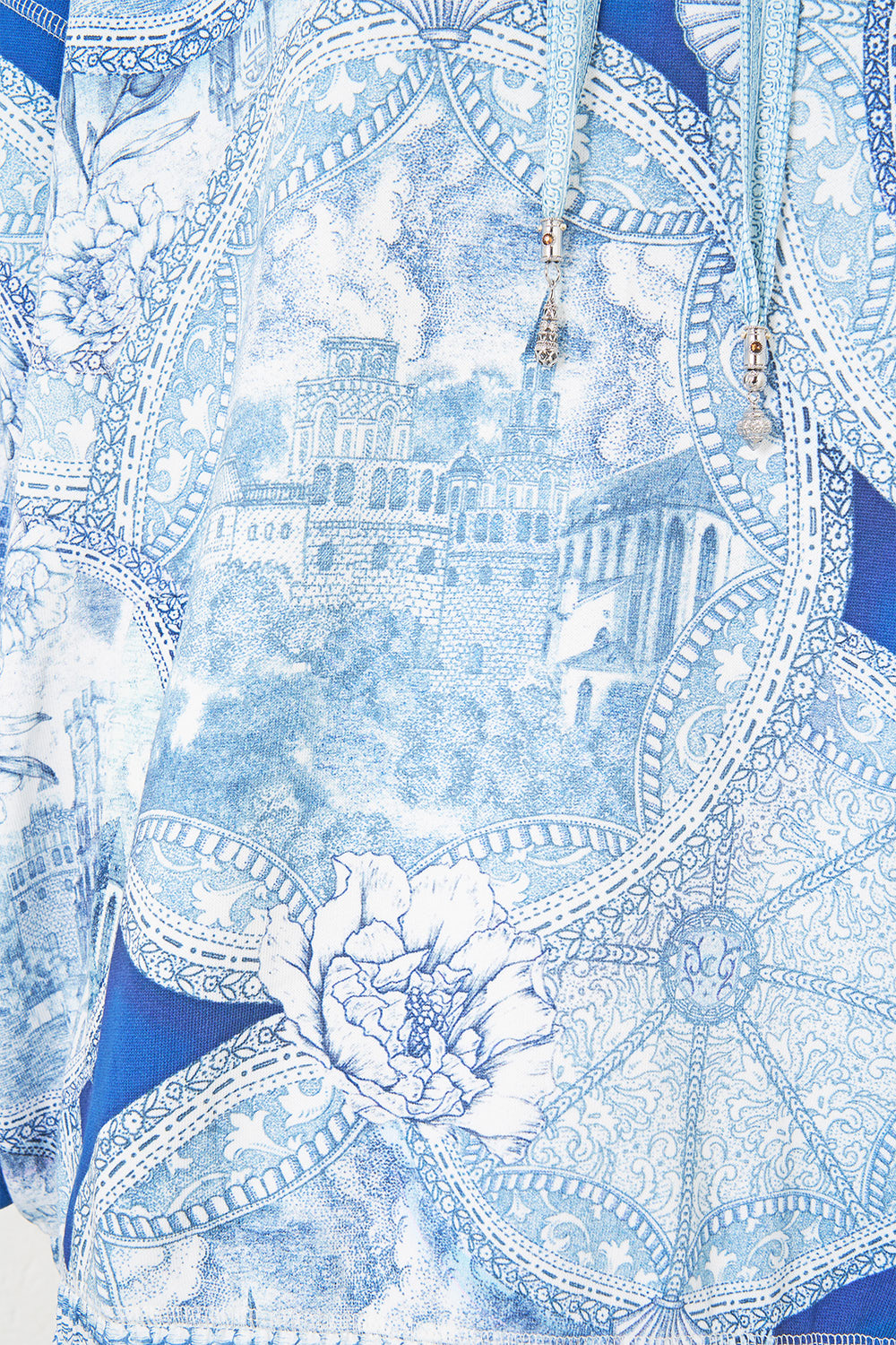 The CAMILLA RELAXED KNIT LAYER THE HUM OF THE ALHAMBRA in our  print.