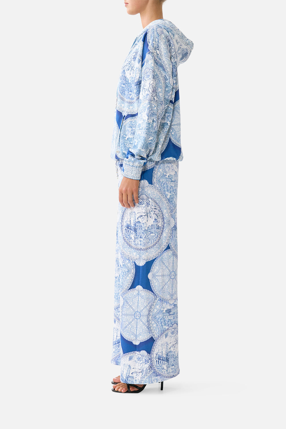 The CAMILLA TIE FRONT ONE PIECE WITH FRILL NECK AND WAIST DAUGHTERS OF DUENDE in our  print.