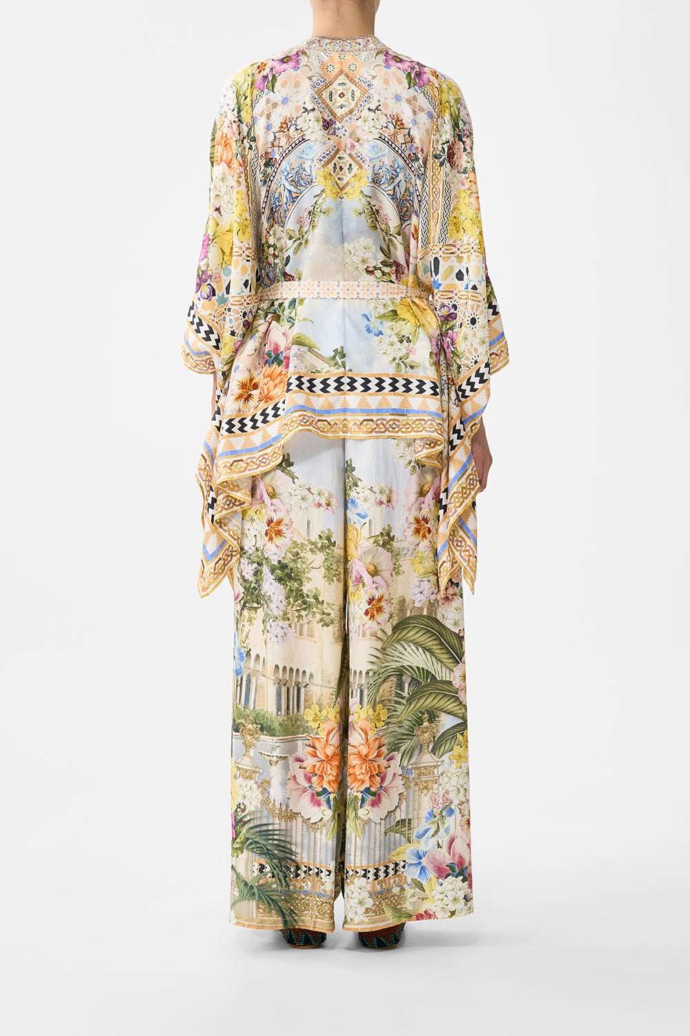 The CAMILLA button through scarf blouse in our print The Architects of Alcázar. Back model view.
