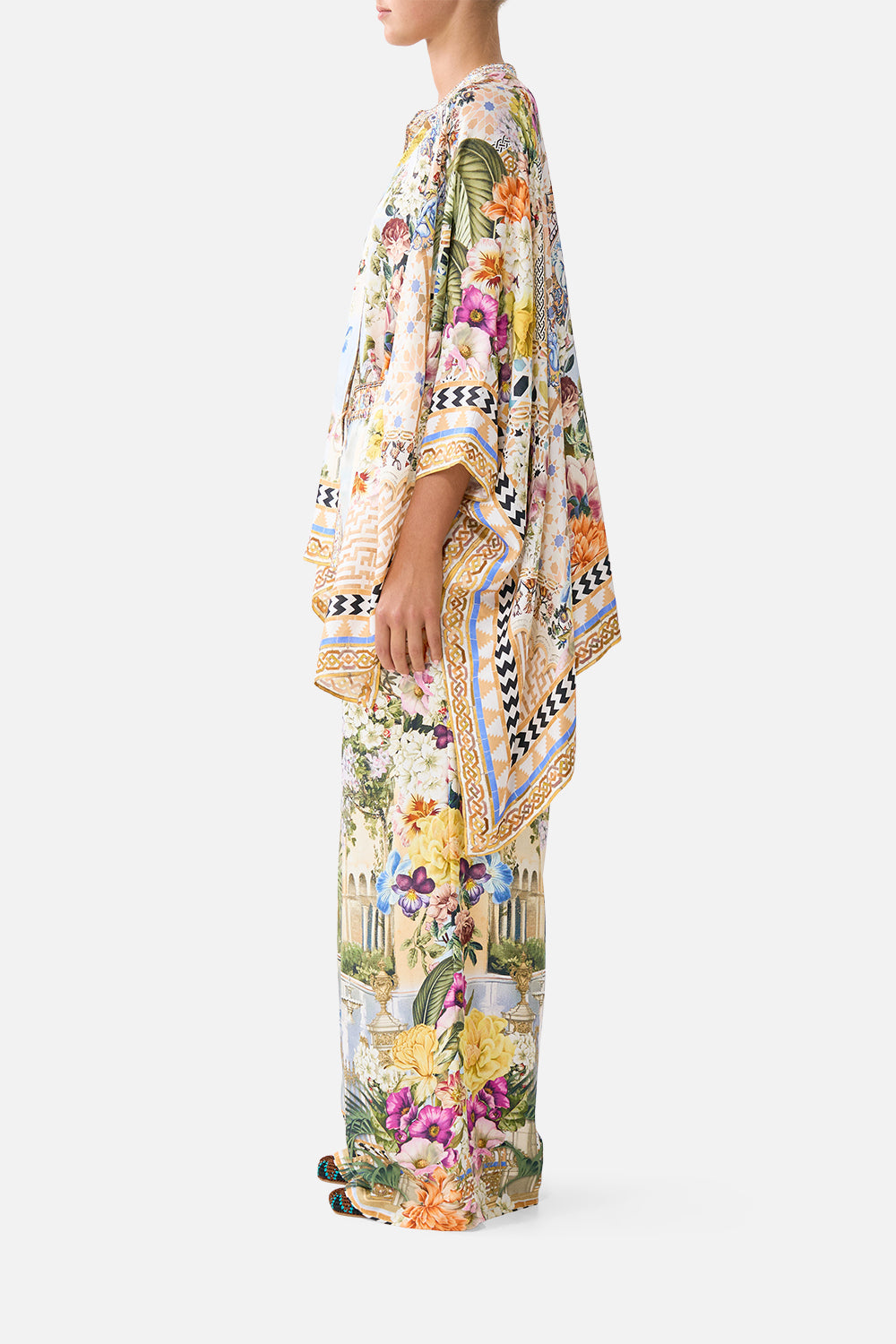 The CAMILLA straight leg pant in our print The Architects of Alcázar. Side model view.