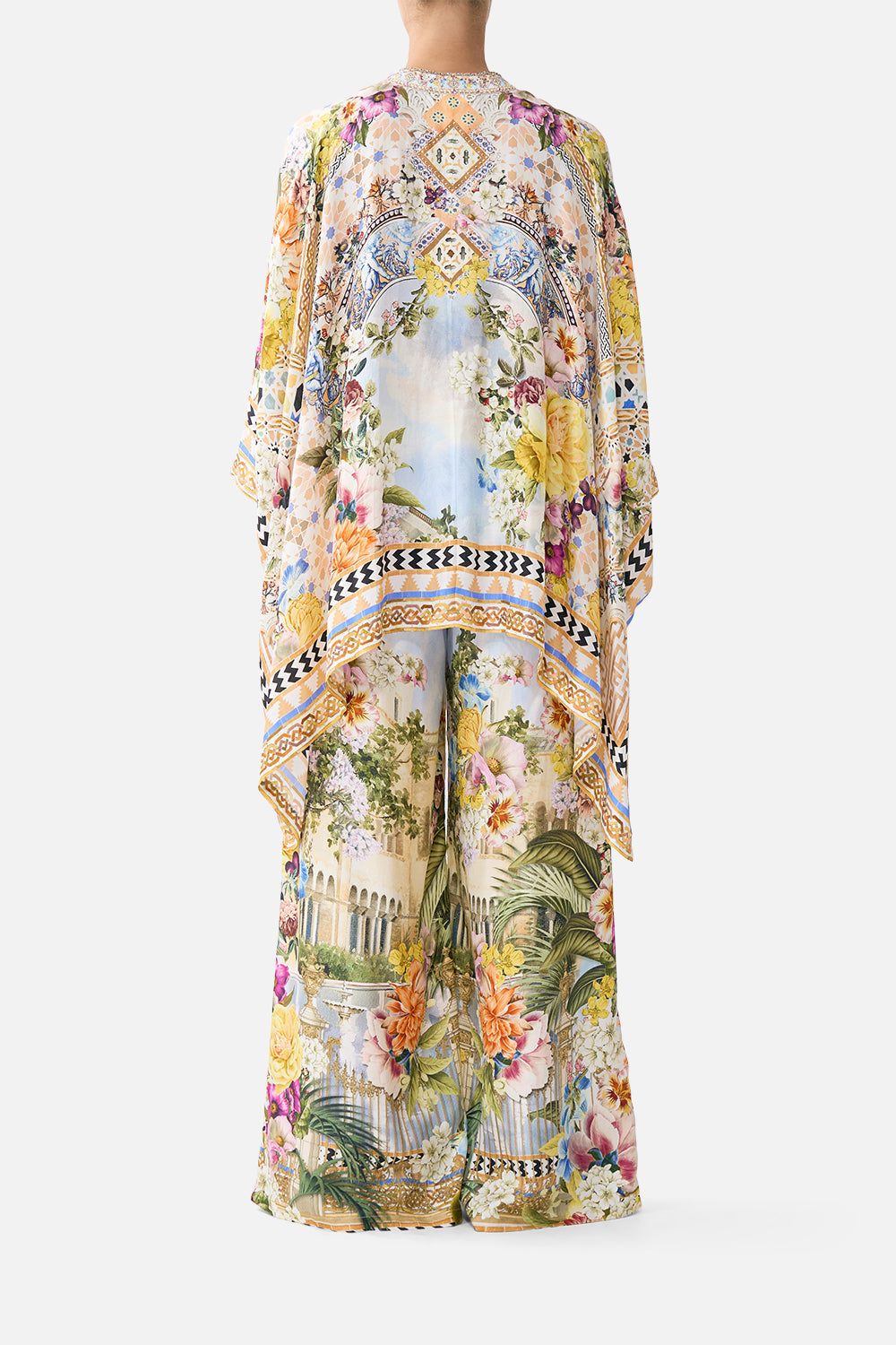 The CAMILLA straight leg pant in our print The Architects of Alcázar. Back model view.