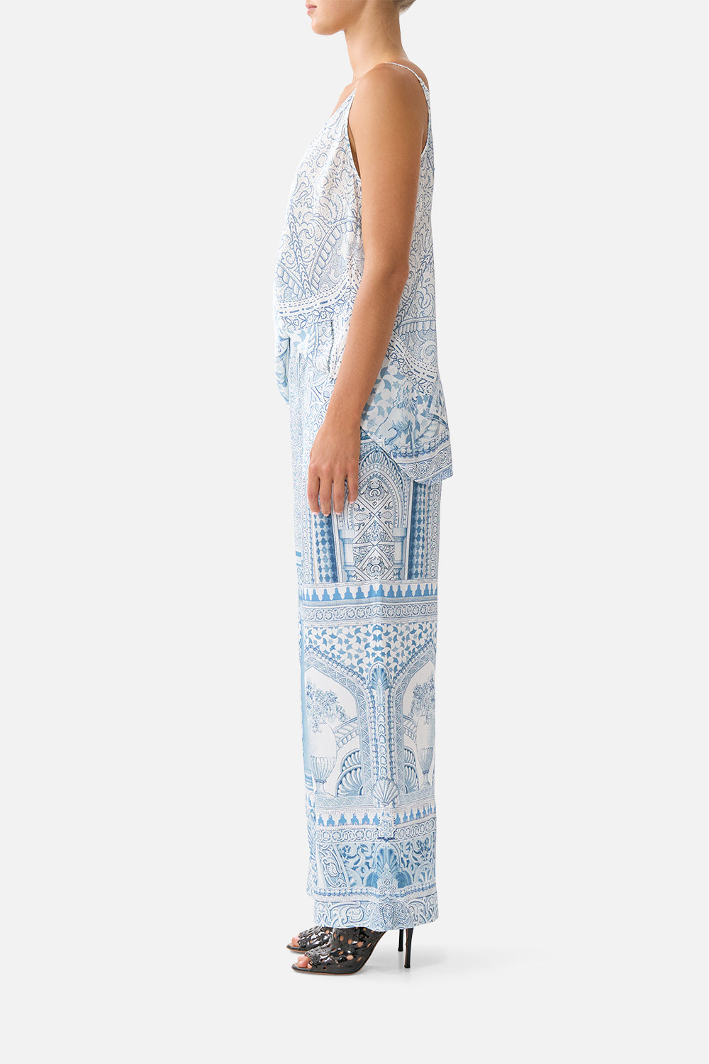 The CAMILLA button front lounge pant in our print The Hum of the Alhambra. Side model view.
