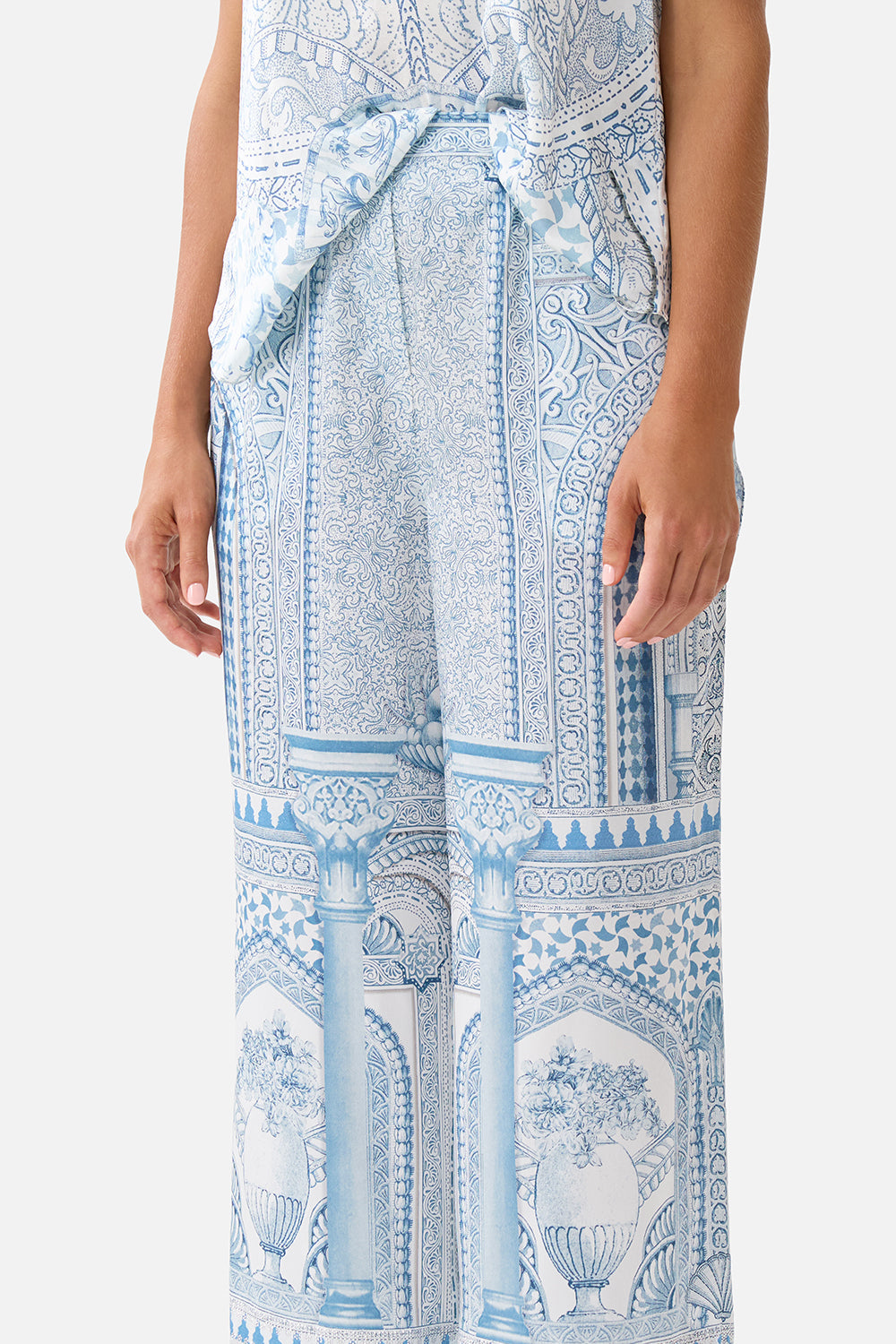The CAMILLA FRILL V NECK KNIT TOP FLAMENCO FOLKLORE in our  print.