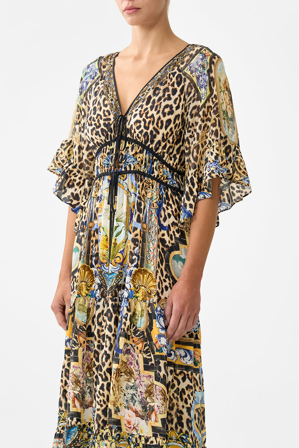 The CAMILLA CROPPED WRAP SHIRT THE HUM OF THE ALHAMBRA in our  print.