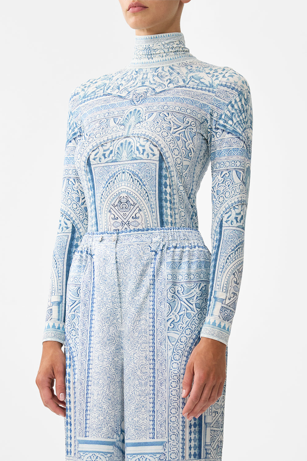 The CAMILLA OVERSIZED TEE WITH LACE TRIM DAUGHTERS OF DUENDE in our  print.