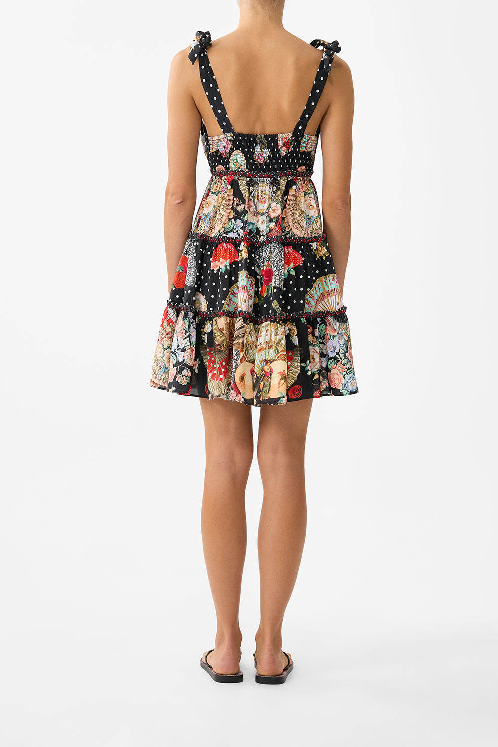The CAMILLA RUFFLE TOP WITH TIE FRONT DETAIL TORERO LIBERTINE in our TORERO LIBERTINE print.