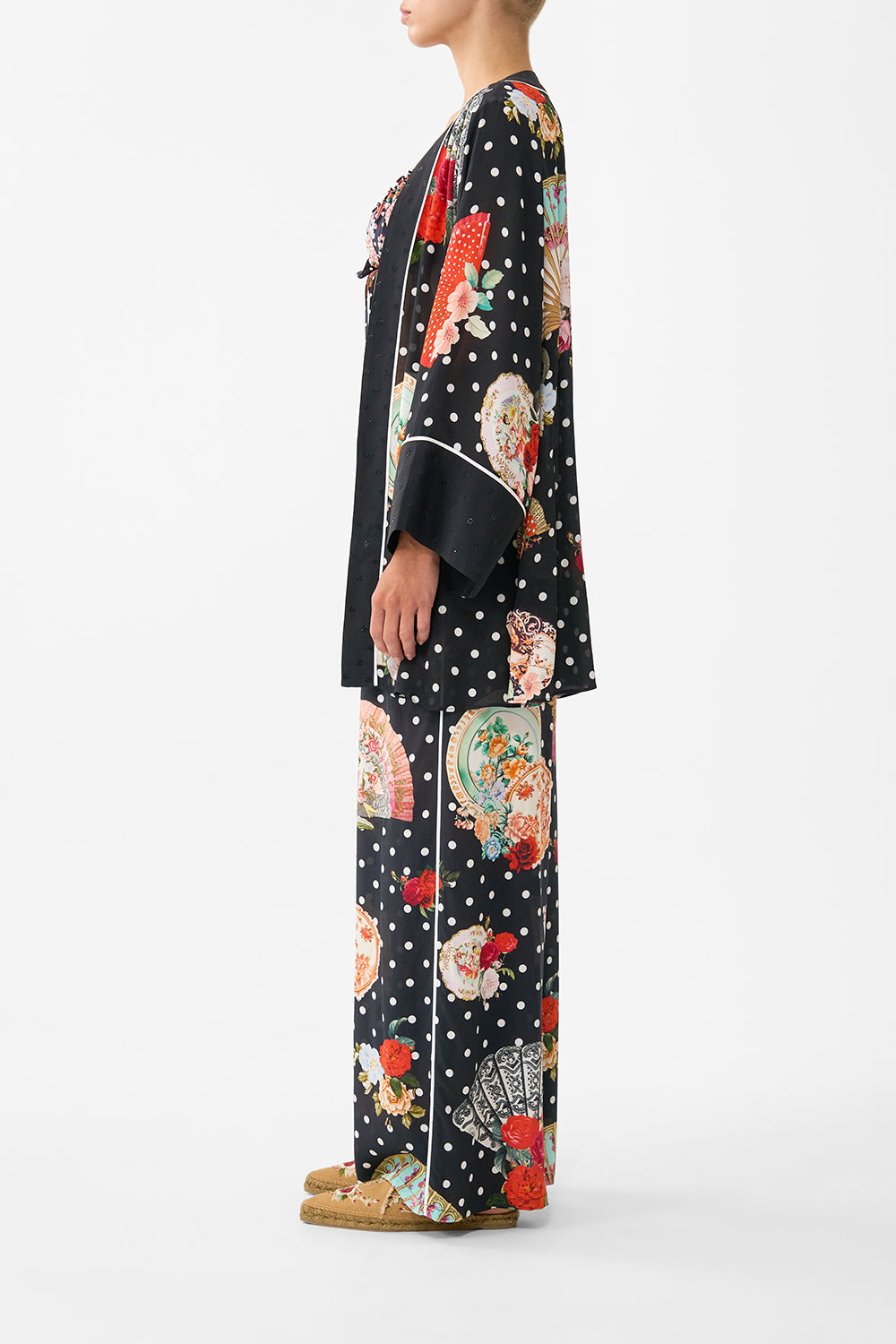 The CAMILLA MULTI WEAR BEACH MIDI DRESS WITH RING FRONT SEVILLIAN STYLE in our SEVILLIAN STYLE print.