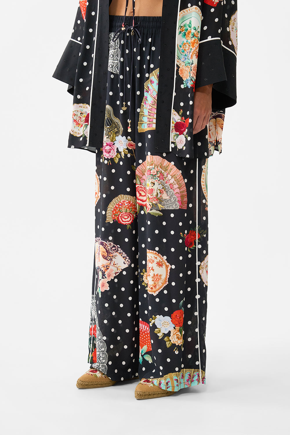 The CAMILLA MULTI WEAR BEACH MIDI DRESS WITH RING FRONT SEVILLIAN STYLE in our  print.