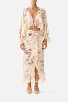 WRAP TIE SKIRT WITH RUFFLE ADORNED IN ARANJUEZ