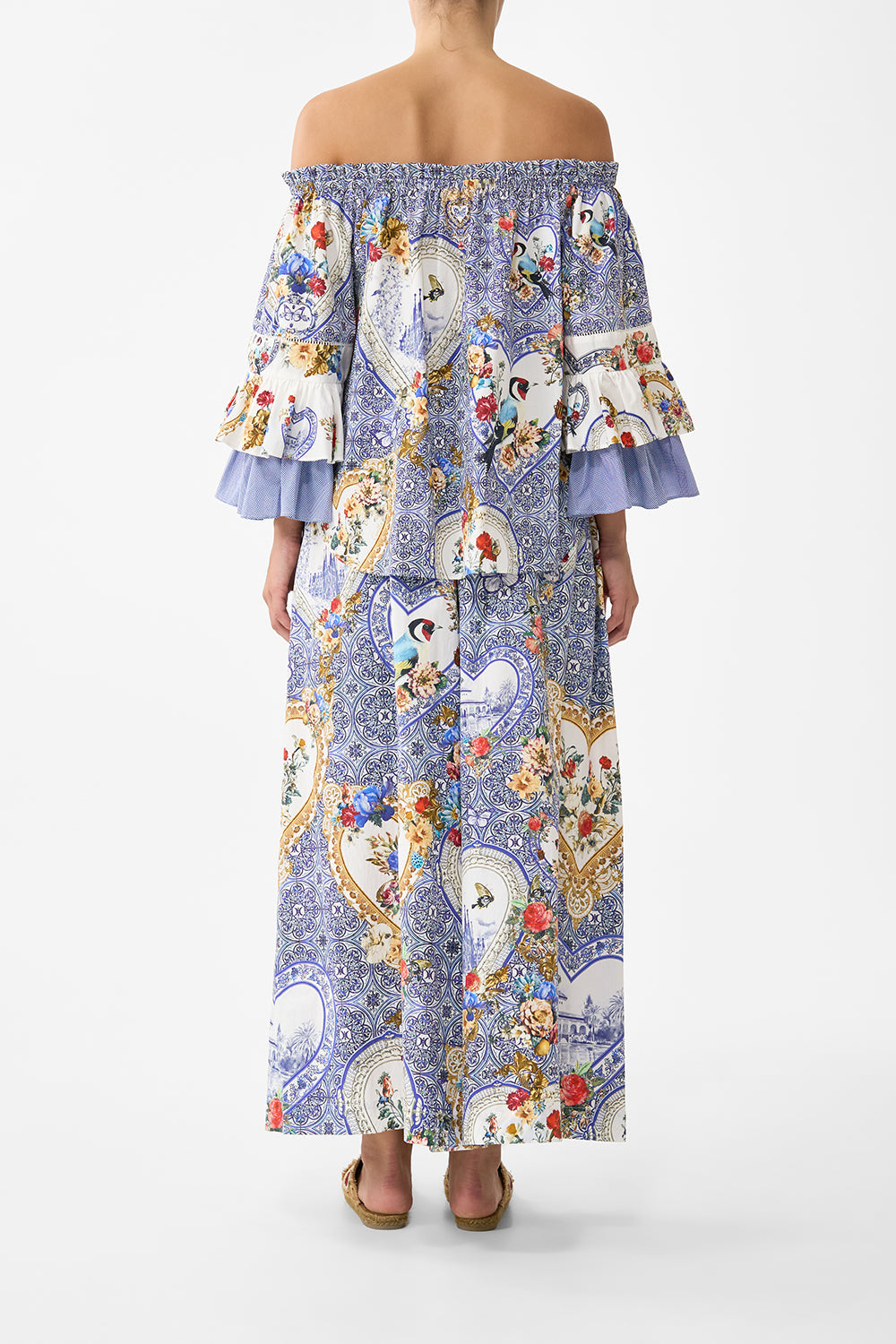 The CAMILLA HALTER JERSEY DRESS WITH TIERED SKIRT SEVILLIAN STYLE in our  print.
