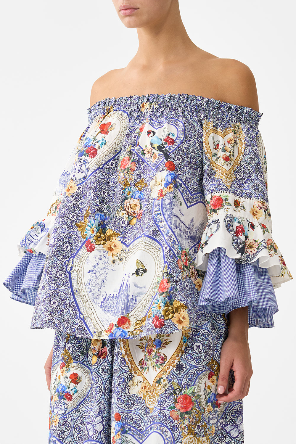 The CAMILLA SHAPED WAISTBAND DRESS WITH FLUTTER SLEEVES ESPAÑA NIRVANA in our  print.
