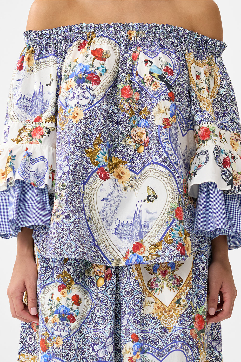 The CAMILLA SHAPED WAISTBAND DRESS WITH FLUTTER SLEEVES ESPAÑA NIRVANA in our  print.