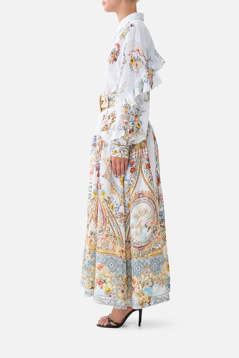 The CAMILLA button shirt with frill detail in our print Seville Sweetheart. Side model view.
