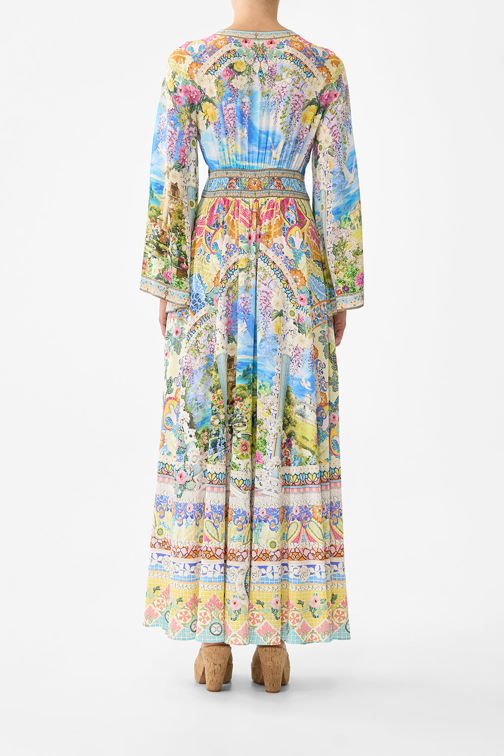 The CAMILLA kimono sleeve dress with shirring detail in our print Navàs Nouveau. Back model view.