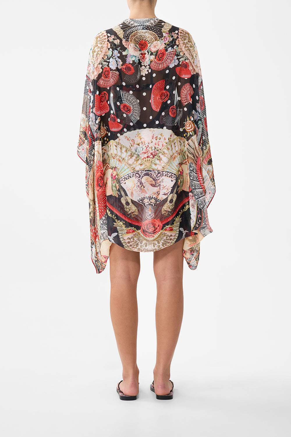 The CAMILLA ROUND NECK KAFTAN SACRAMENTE in our  print.