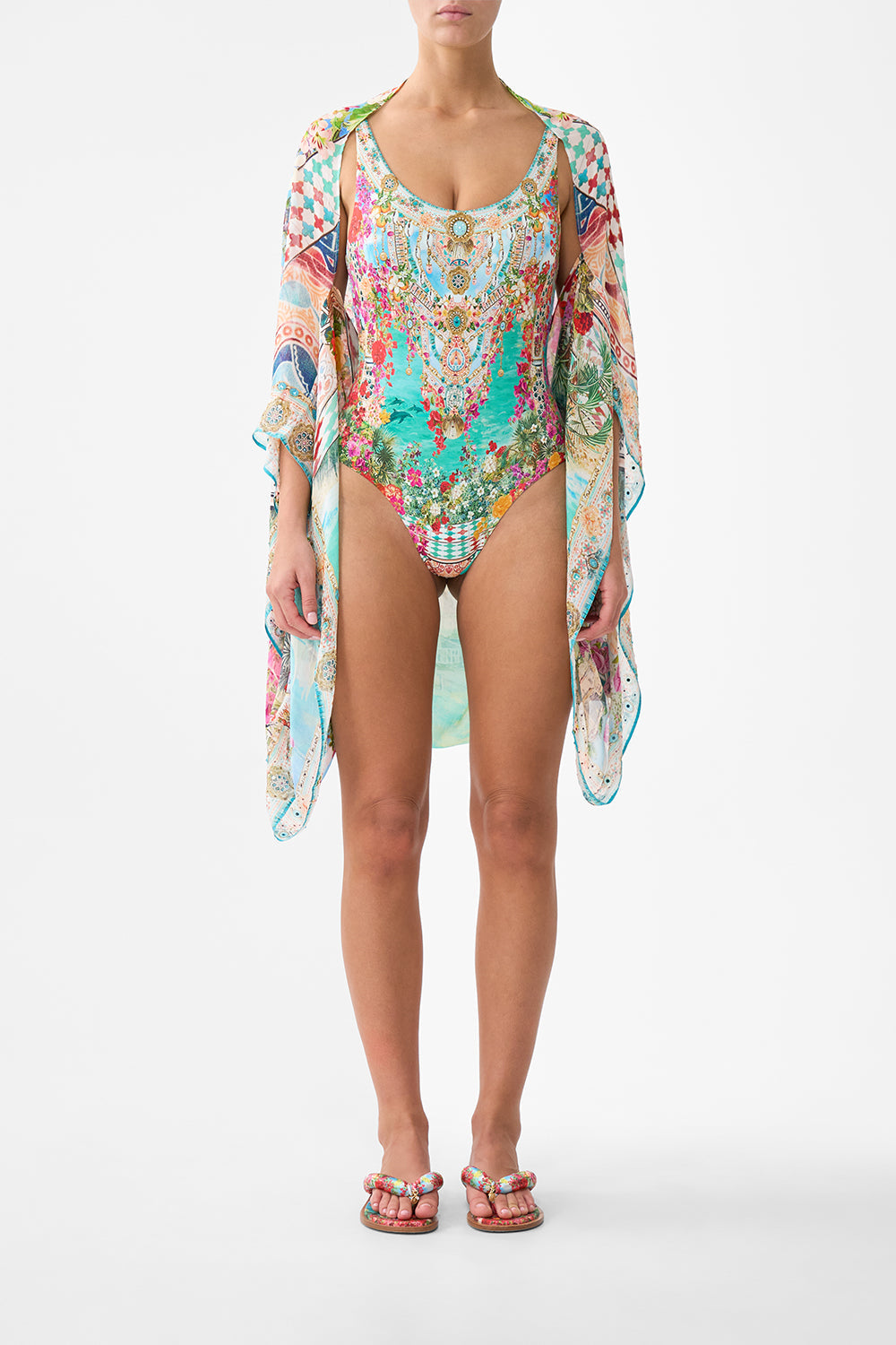 The CAMILLA BUTTON FRONT HALTER PLAYSUIT BALEARIC BEBÉ in our  print.
