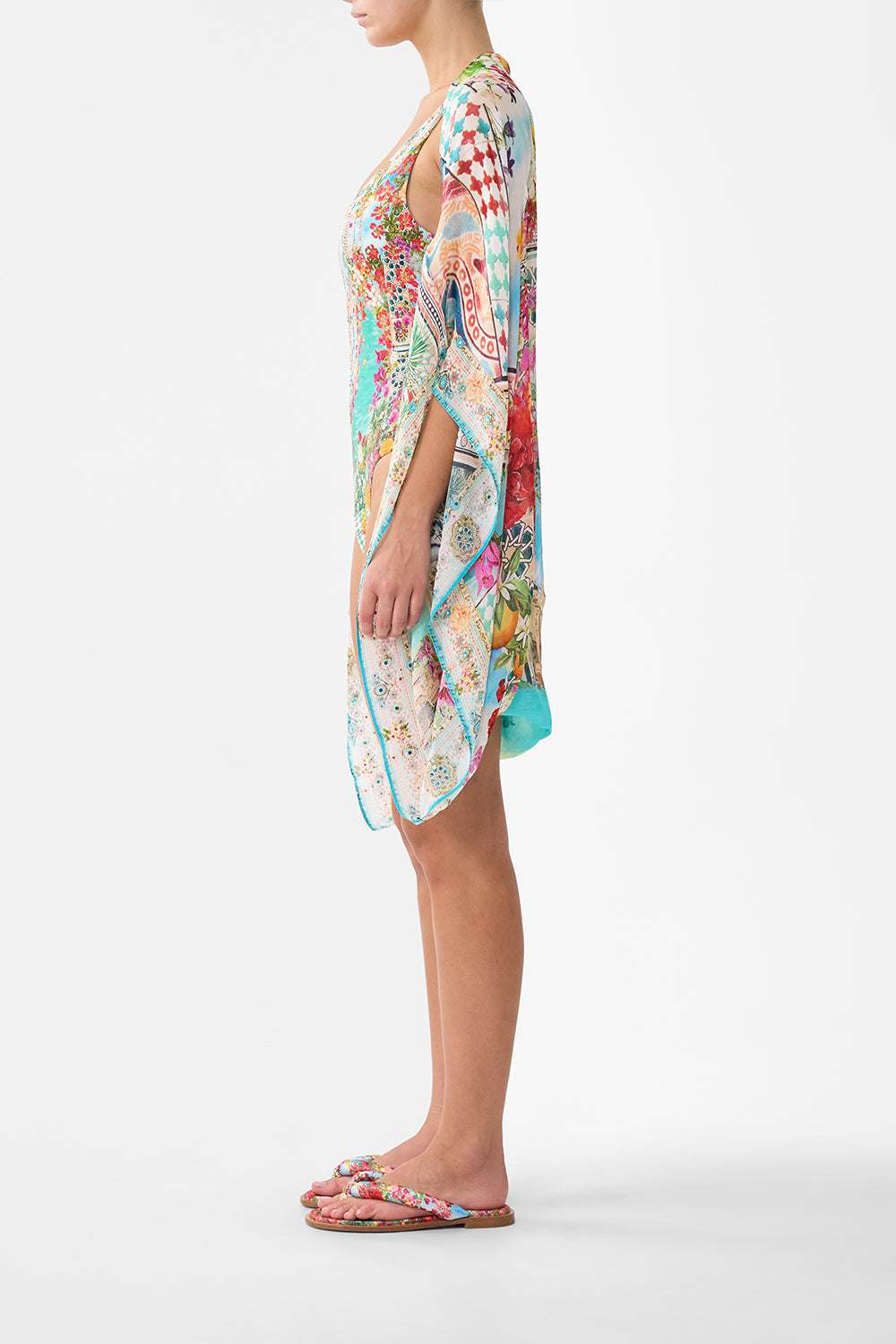 The CAMILLA BUTTON FRONT HALTER PLAYSUIT BALEARIC BEBÉ in our  print.