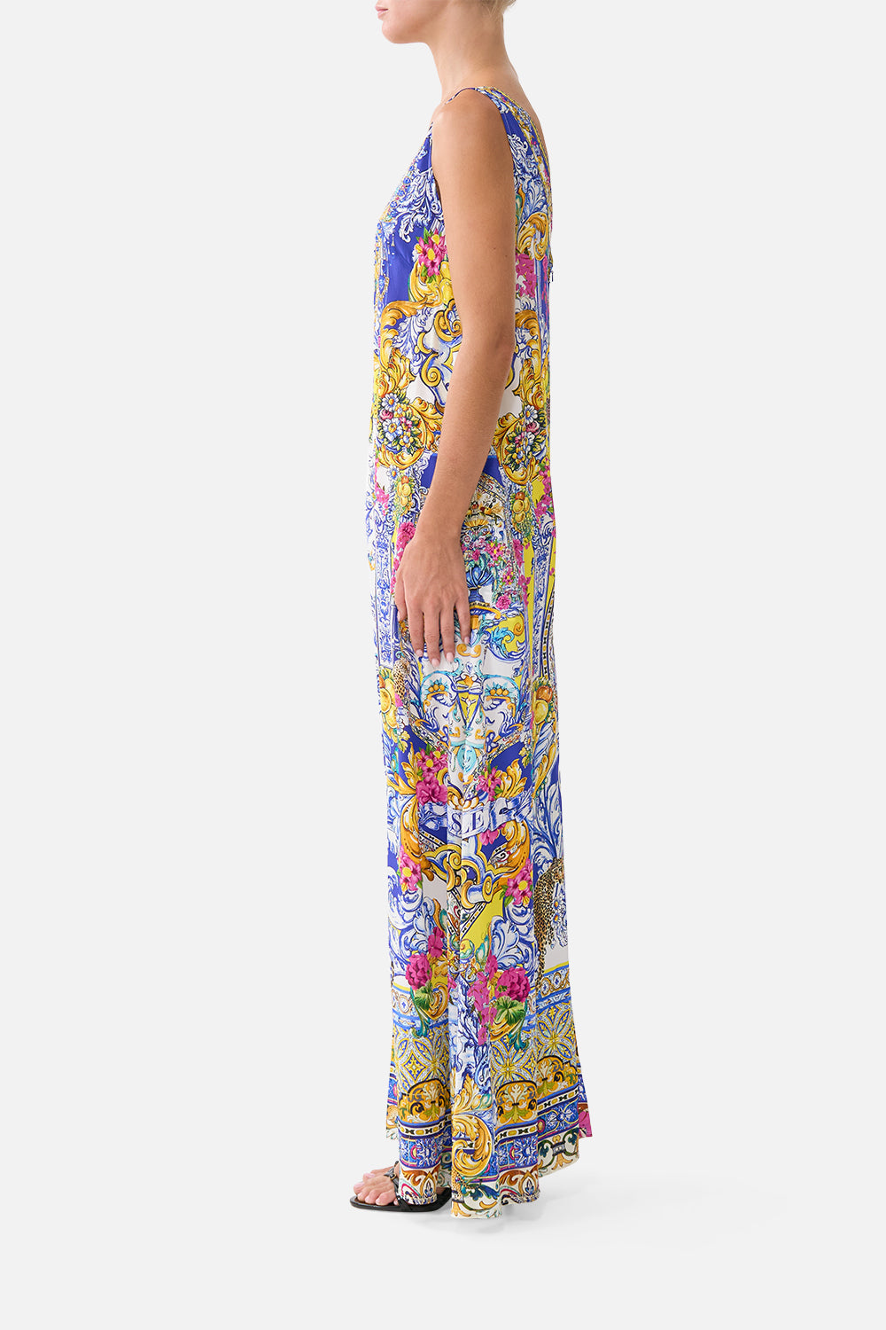 The CAMILLA KIDS TIE STRAP MAXI DRESS WITH PINTUCKS DANDELION SKIES in our DANDELION SKIES print.
