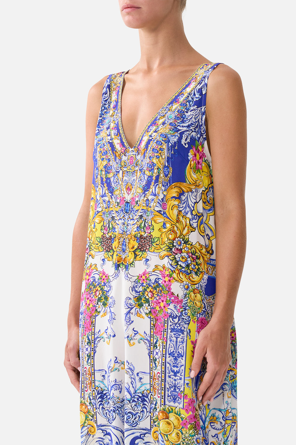 The CAMILLA KIDS TIE STRAP MAXI DRESS WITH PINTUCKS DANDELION SKIES in our  print.