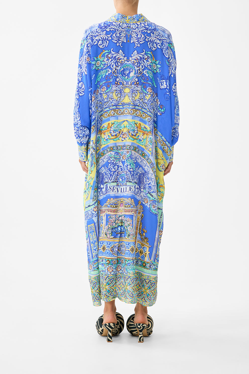 The CAMILLA SHORT SLEEVE CAMP COLLARED SHIRT MAGIC OF THE MERCADO in our MAGIC OF THE MERCADO print.