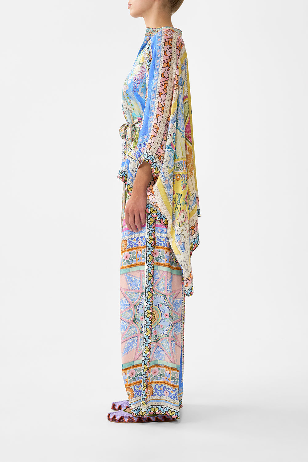The CAMILLA button through scarf blouse in our print Navàs Nouveau. Side model view.