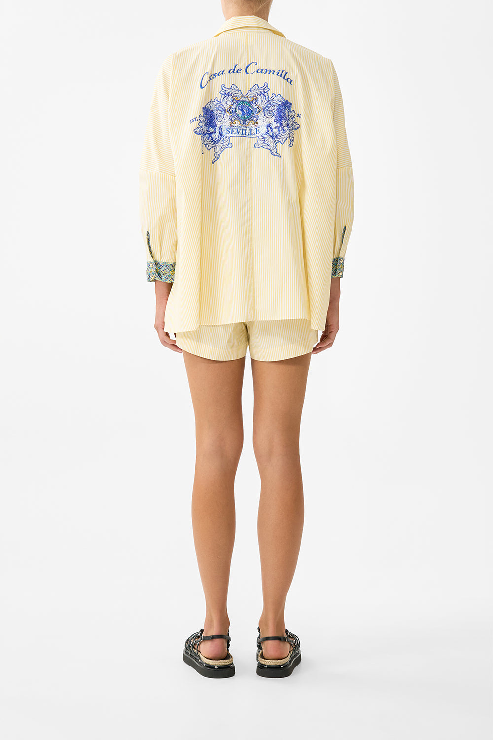 The CAMILLA TIERED SHORT DRESS WITH NECK FRILL SACROMONTE SEÑORITA in our  print.
