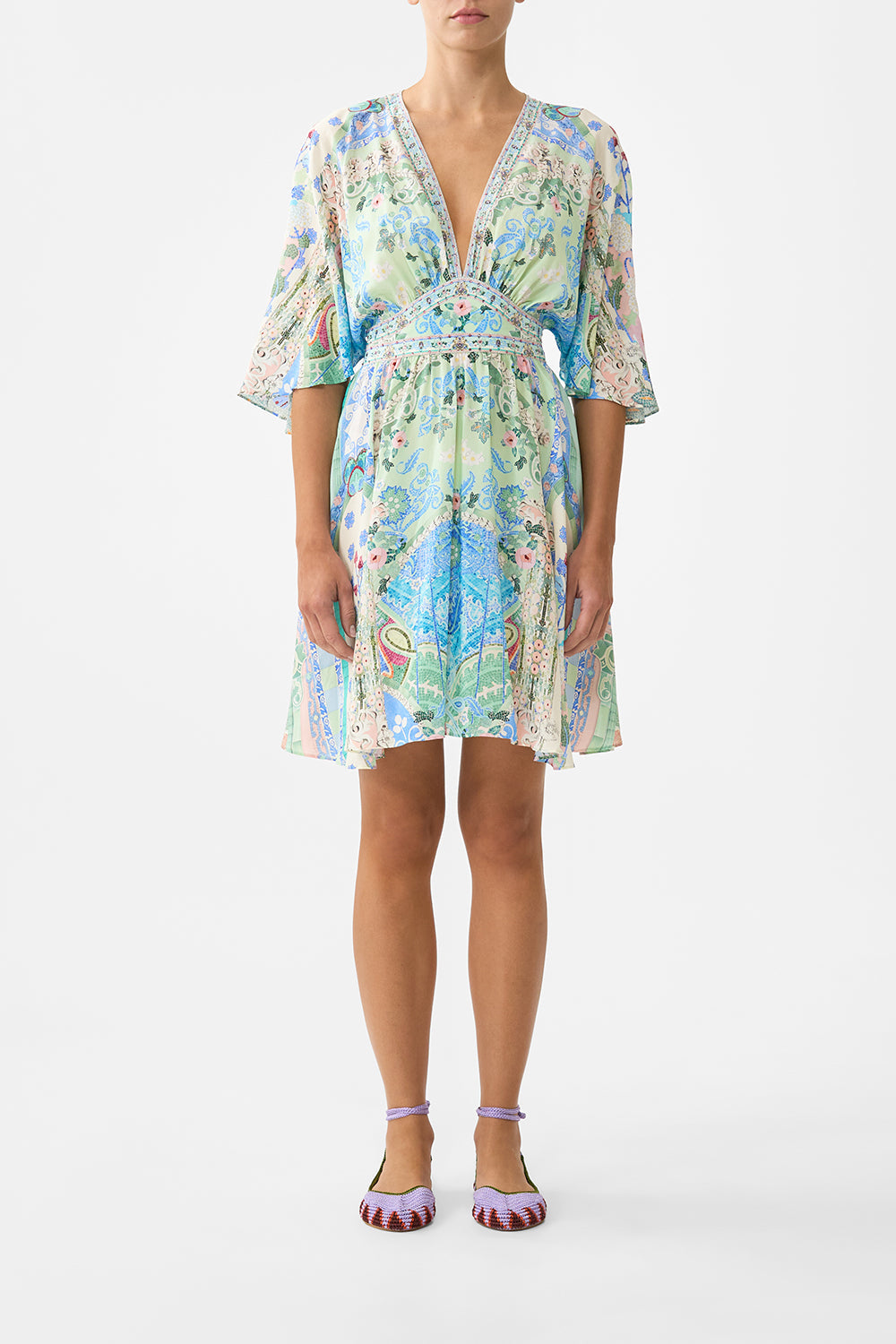 The CAMILLA RUFFLE HIGH LOW DRESS WITH LONG SLEEVE THE HUM OF THE ALHAMBRA in our  print.