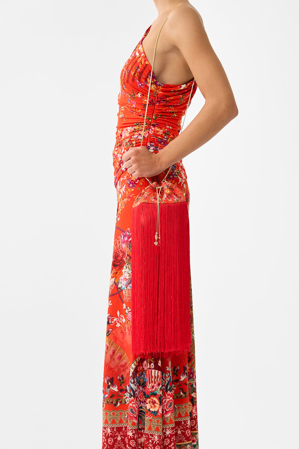 The CAMILLA TIE FRONT ONE PIECE WITH FRILL NECK AND WAIST DAUGHTERS OF DUENDE in our  print.