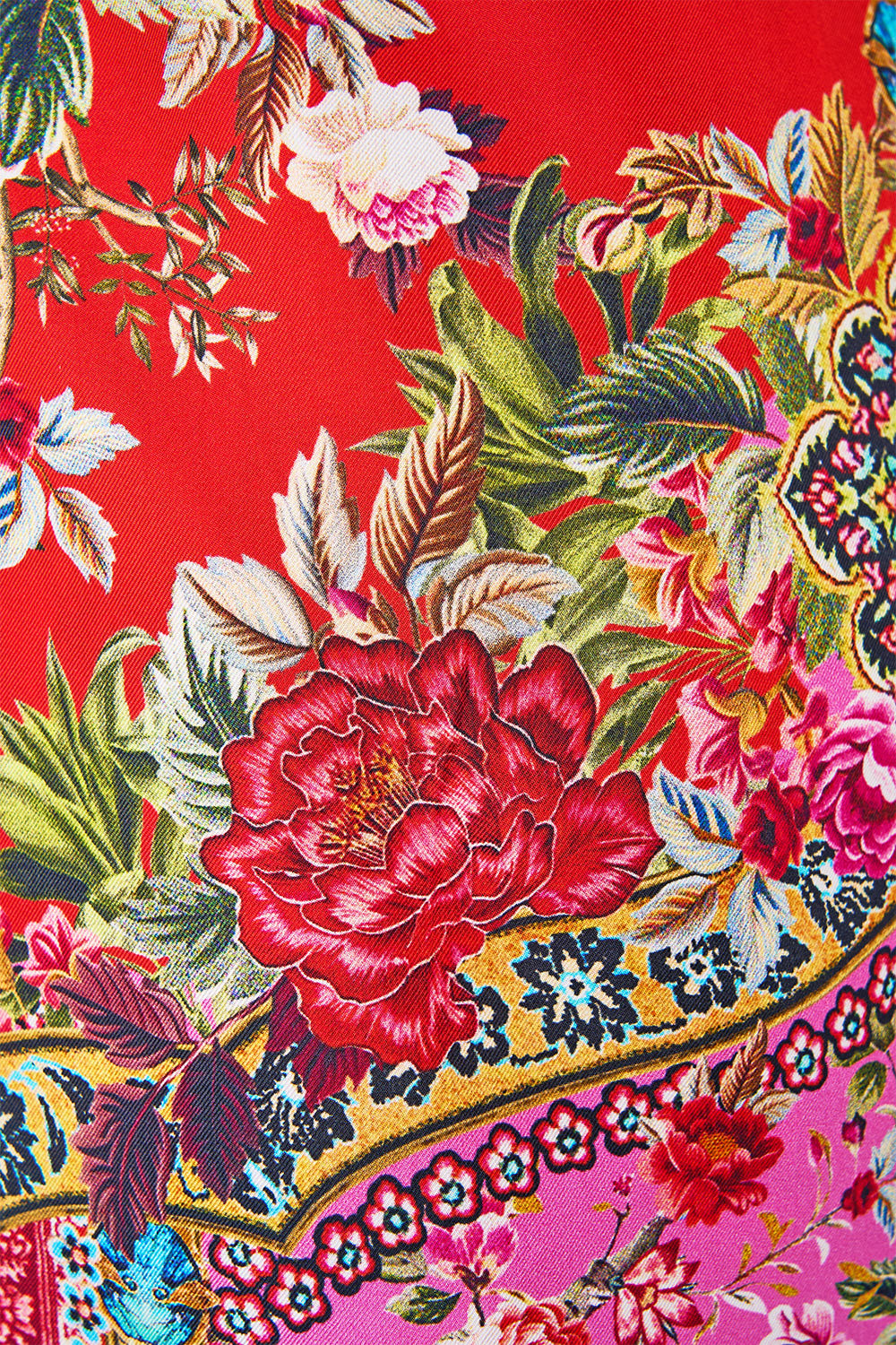The CAMILLA SHORT SLEEVE OVERSIZED SHIRT HOUSE OF HOROSCOPES in our  print.