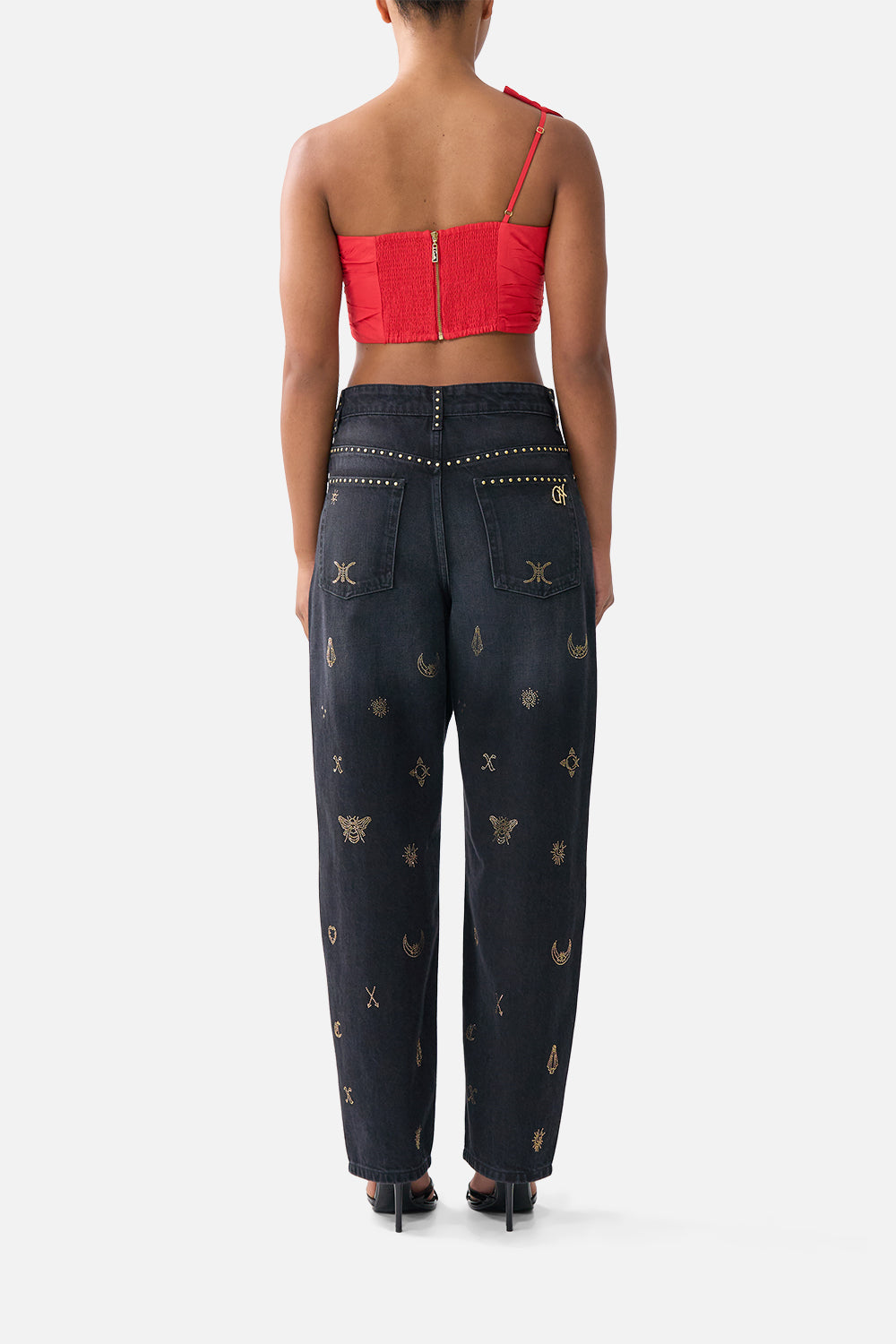 The CAMILLA HIGH TRI ONE PIECE WITH EYELET TIE FRONT TRIM ESPAÑA NIRVANA in our  print.