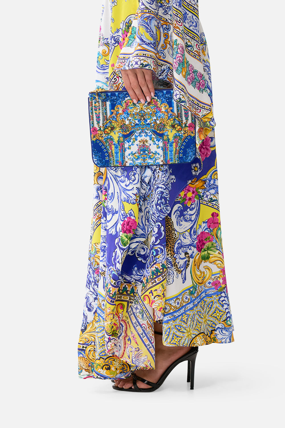 The CAMILLA small canvas clutch in our print España Nirvana. Front model view.