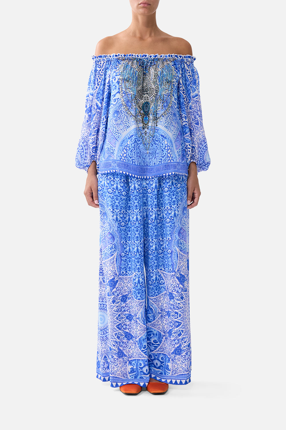 The CAMILLA V-NECK FULL LENGTH BIAS SLIP DRESS NAZAR NIRVANA in our NAZAR NIRVANA print.