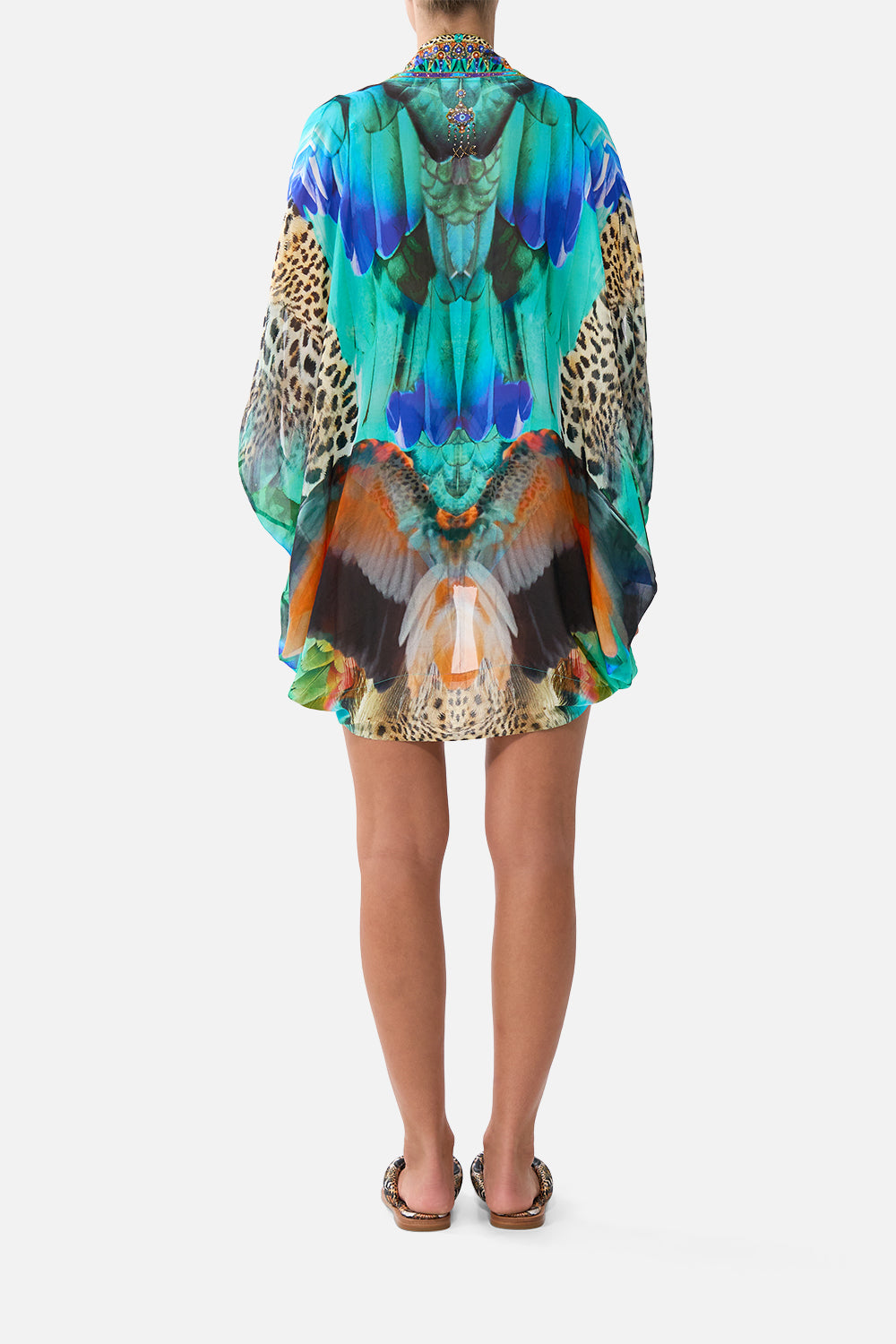 The CAMILLA WAISTED DRESS WITH HEM RUFFLE MEET ME IN MALLORCA in our  print.