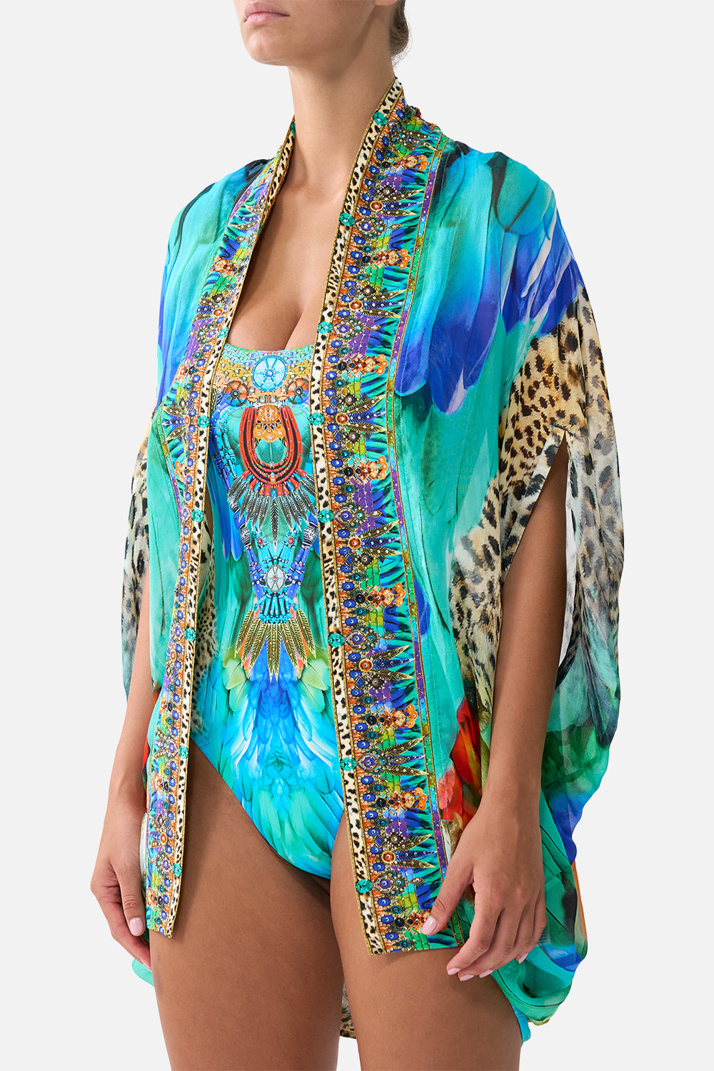 The CAMILLA WAISTED DRESS WITH HEM RUFFLE MEET ME IN MALLORCA in our  print.
