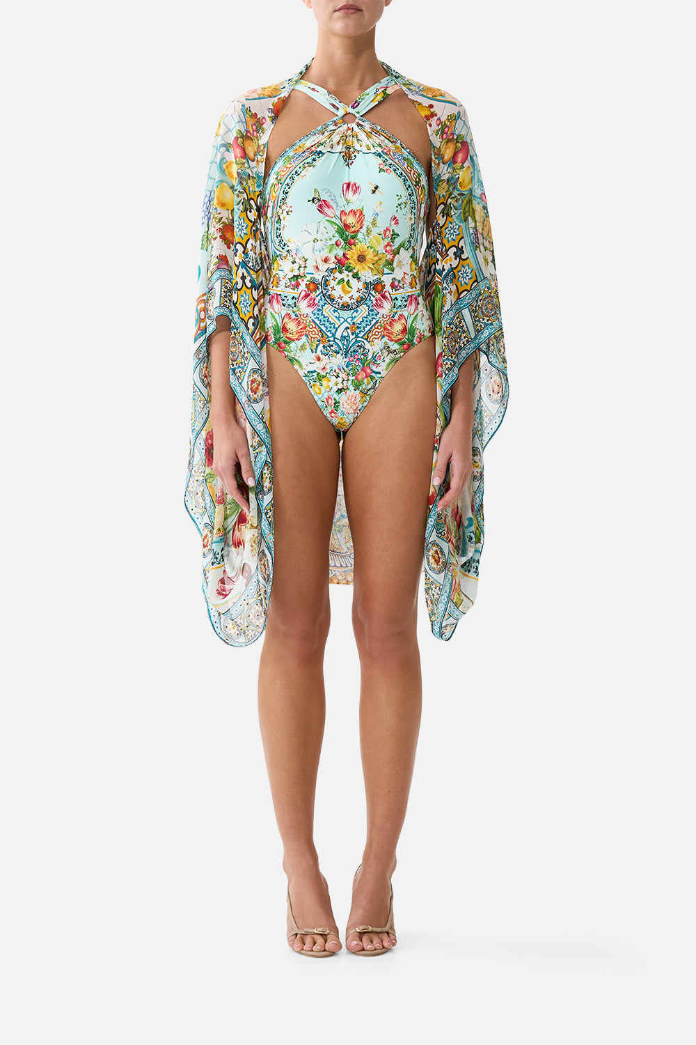 The CAMILLA PLUNGE HALTER ONE PIECE WITH BAR FRONT TRIM DE NADA GRANADA in our DE NADA GRANADA print.