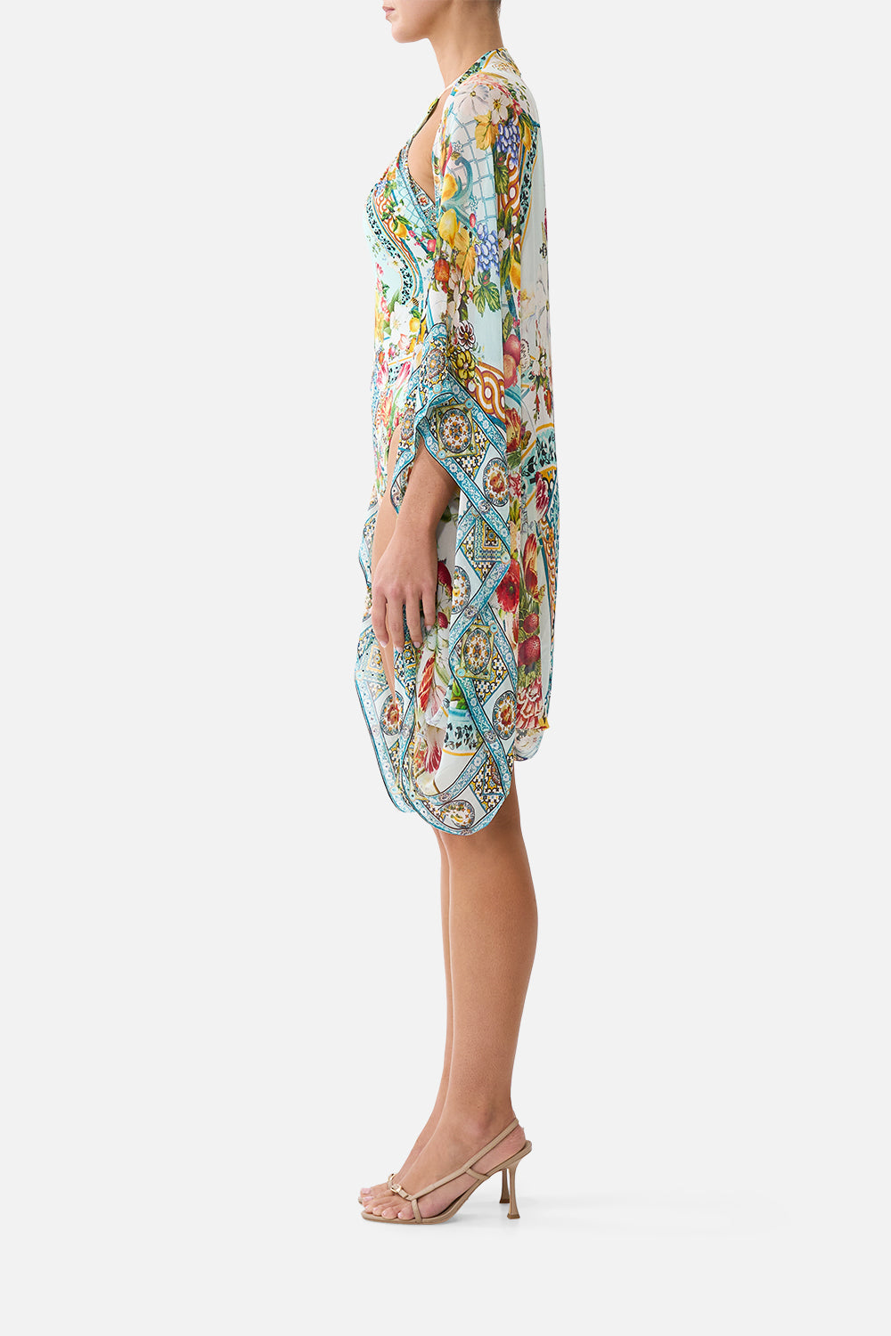The CAMILLA PLUNGE HALTER ONE PIECE WITH BAR FRONT TRIM DE NADA GRANADA in our  print.
