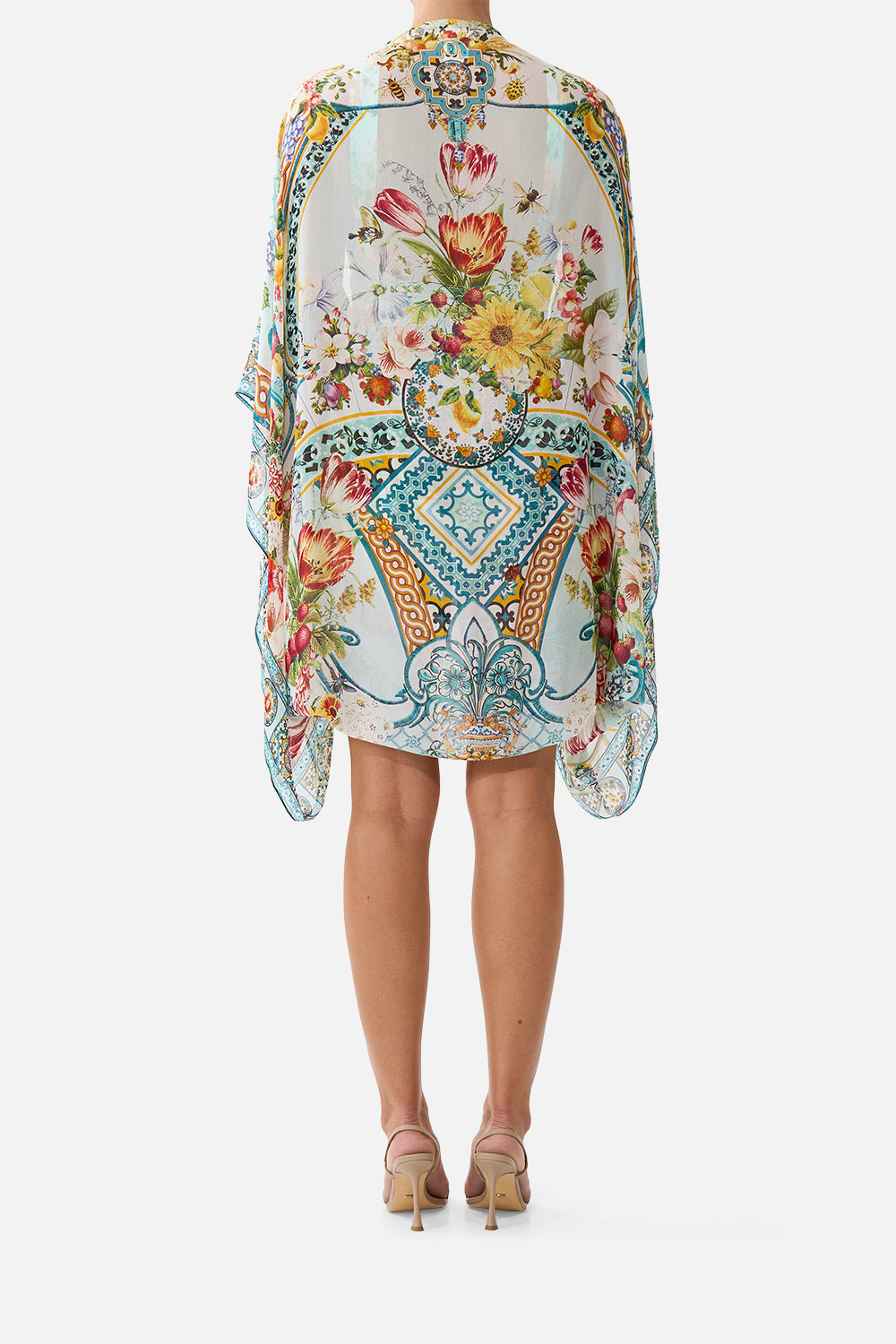 The CAMILLA PLUNGE HALTER ONE PIECE WITH BAR FRONT TRIM DE NADA GRANADA in our  print.