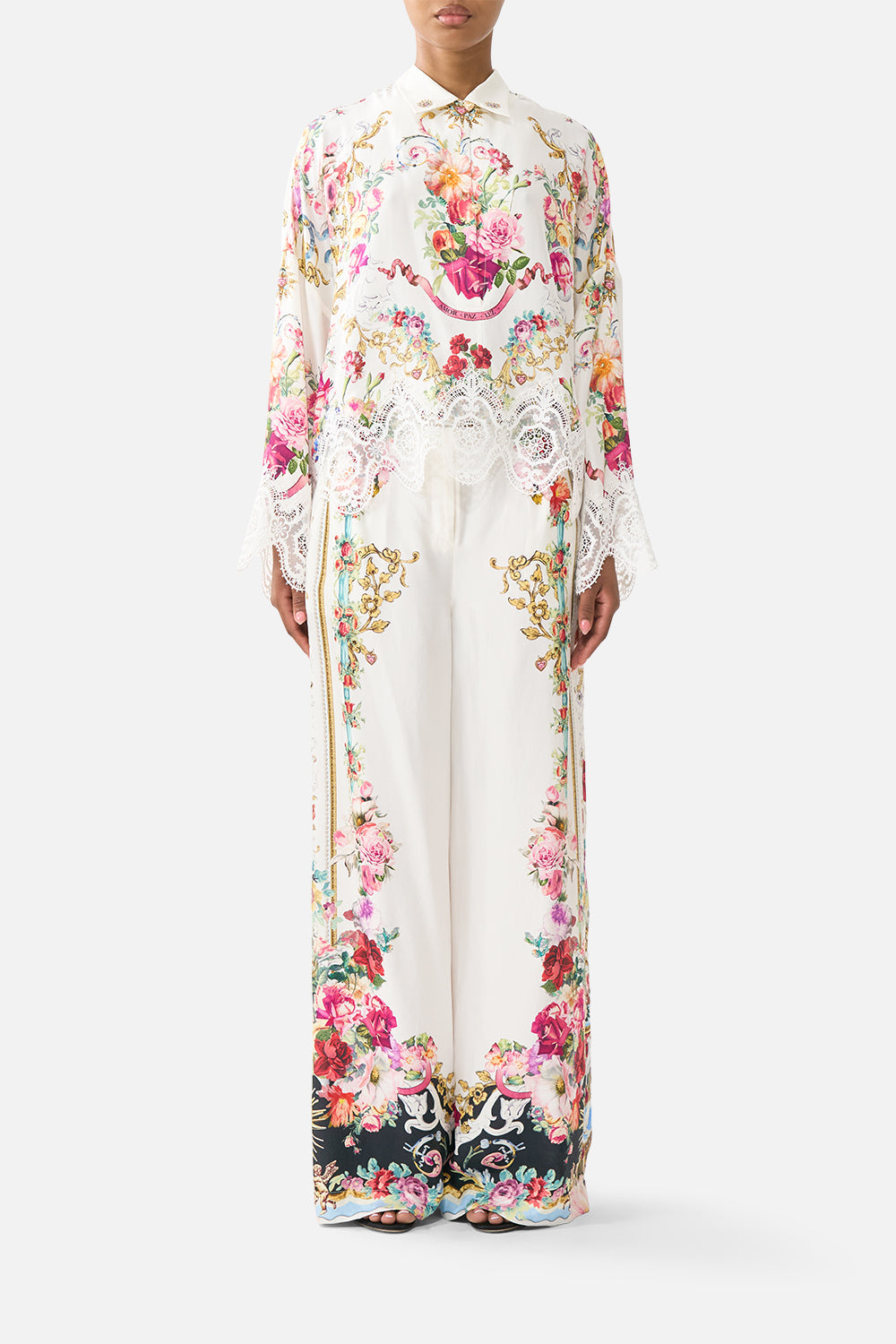 The CAMILLA MINI SHIRT DRESS WITH FEATHERS FIESTA, SIESTA, REPEAT in our  print.