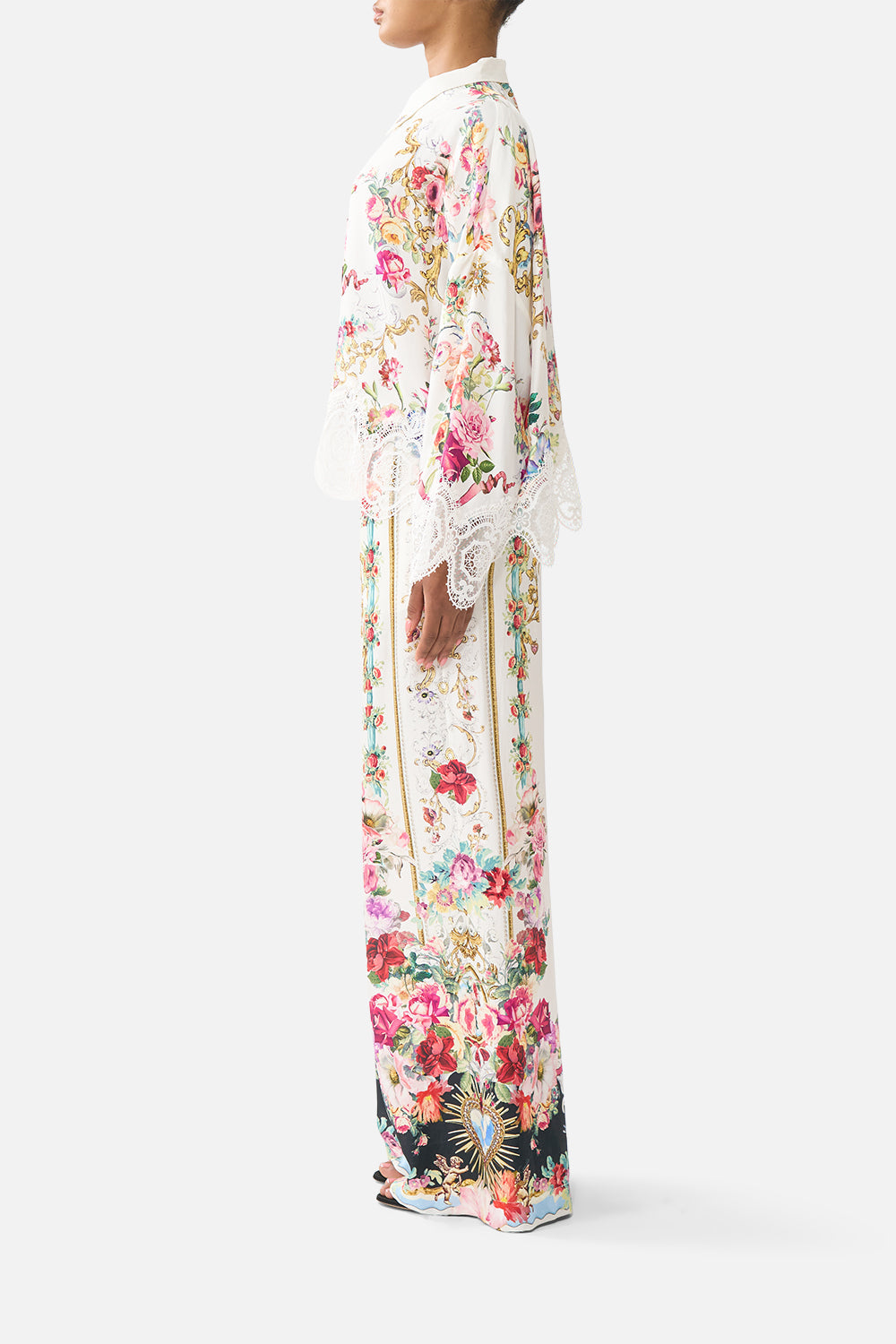 The CAMILLA MINI SHIRT DRESS WITH FEATHERS FIESTA, SIESTA, REPEAT in our  print.