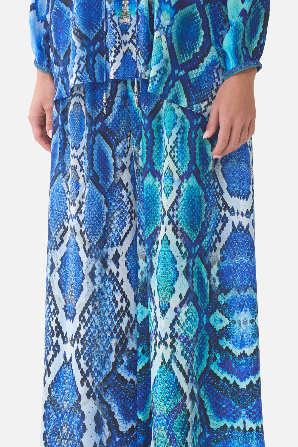 The CAMILLA GATHERED HIGH WAIST BIKINI BOTTOM WITH TIE BACK THE CALL OF CATALONIA in our  print.