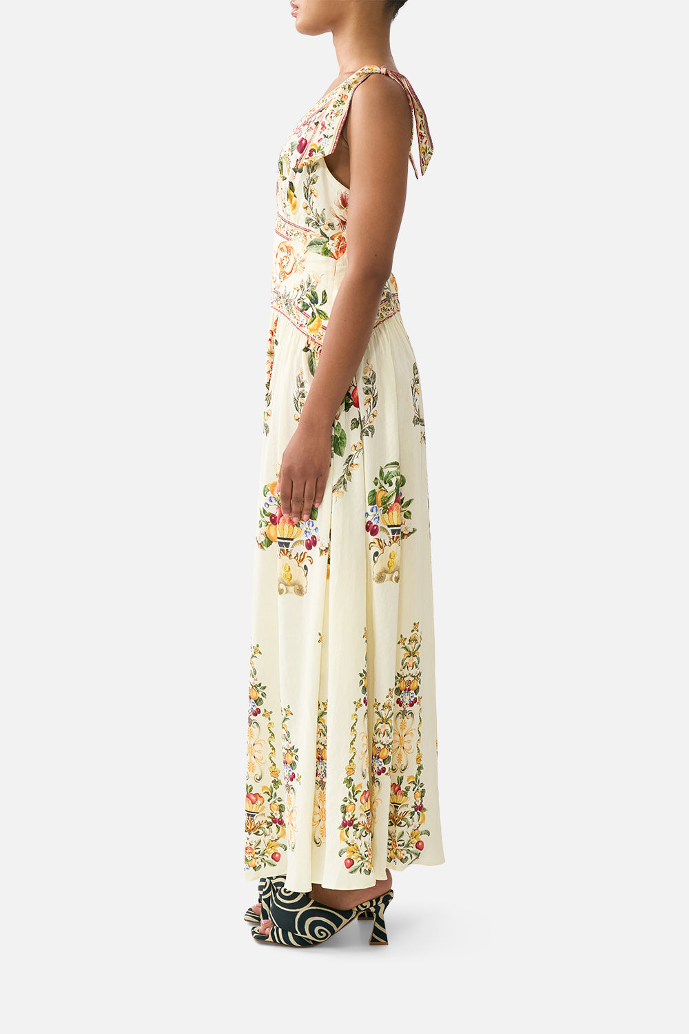 The CAMILLA LONG SARONG W TIE WAIST AND FRILL EDGE LIVIN LA VIDA ROSA in our  print.