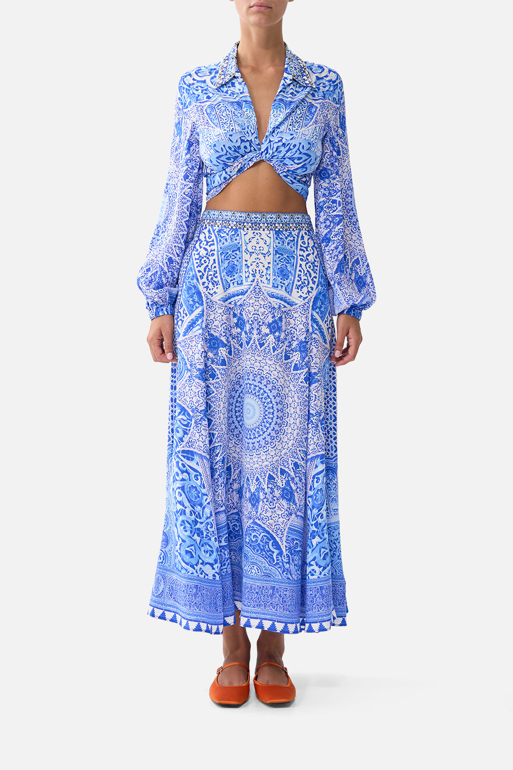 The CAMILLA FRILL NECK DRESS WITH HARDWARE NAZAR NIRVANA in our  print.