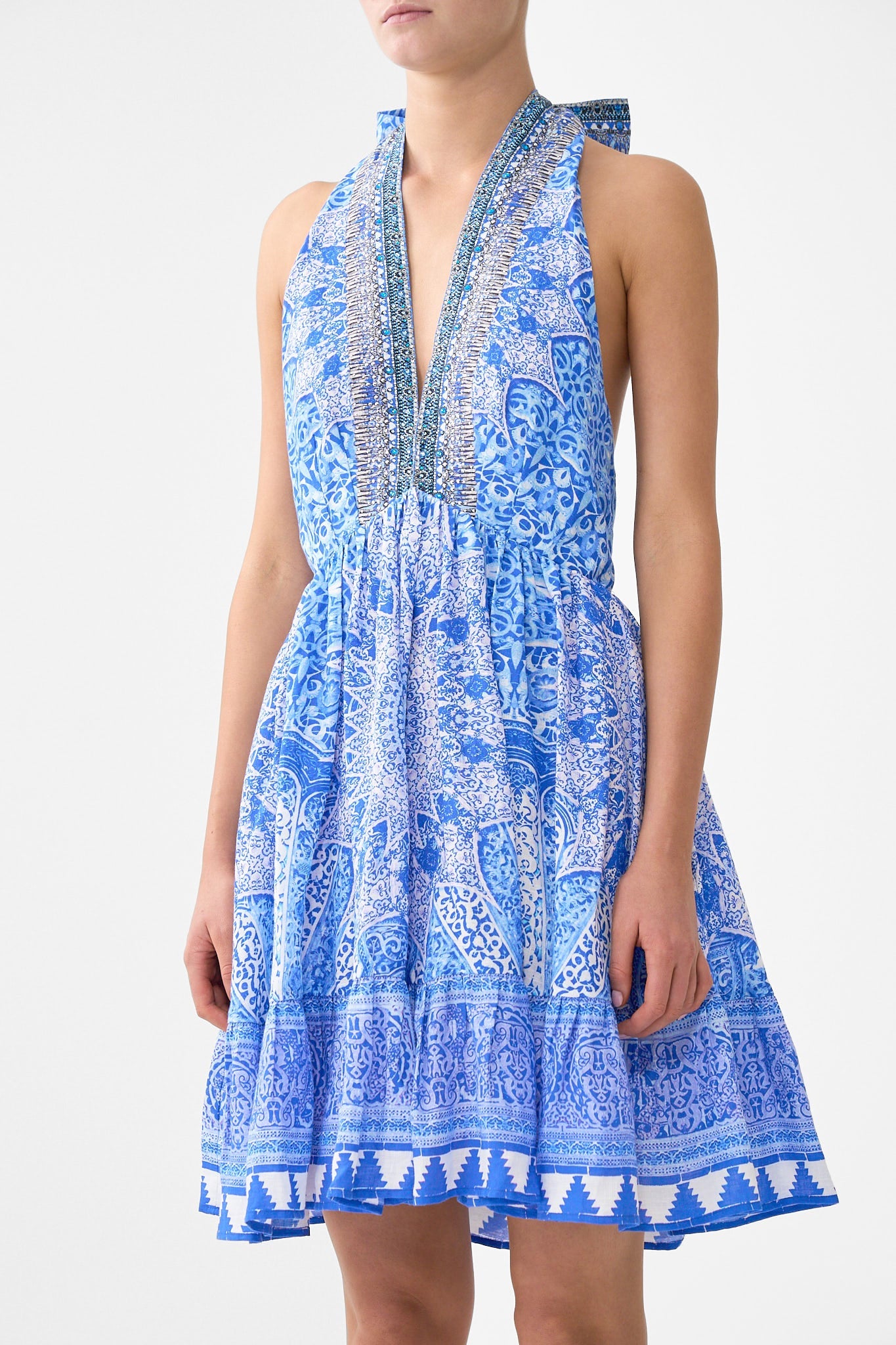 The CAMILLA FEATHER MINI SKIRT AMULETS AND ALCHEMY in our  print.