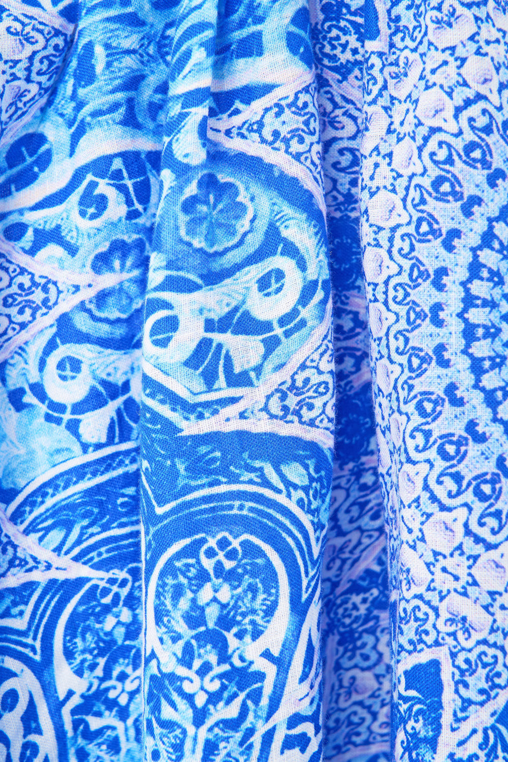 The CAMILLA FEATHER MINI SKIRT AMULETS AND ALCHEMY in our  print.